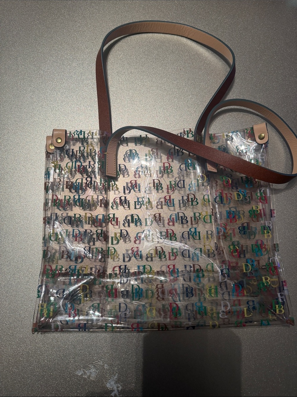 Dooney & Bourke Clear Multicolor Logo Tote with Tan Straps